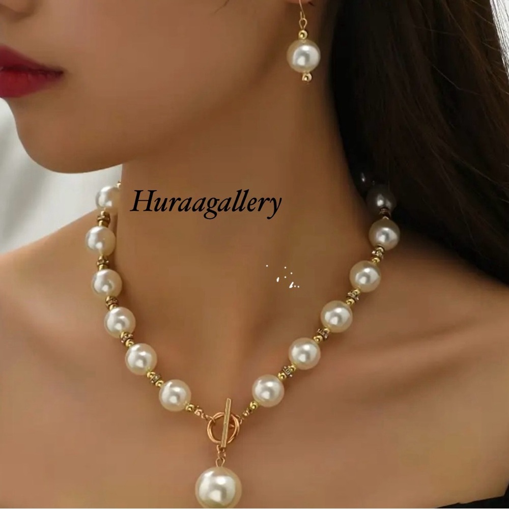 Gallery Gold and White Pearl Necklace Set